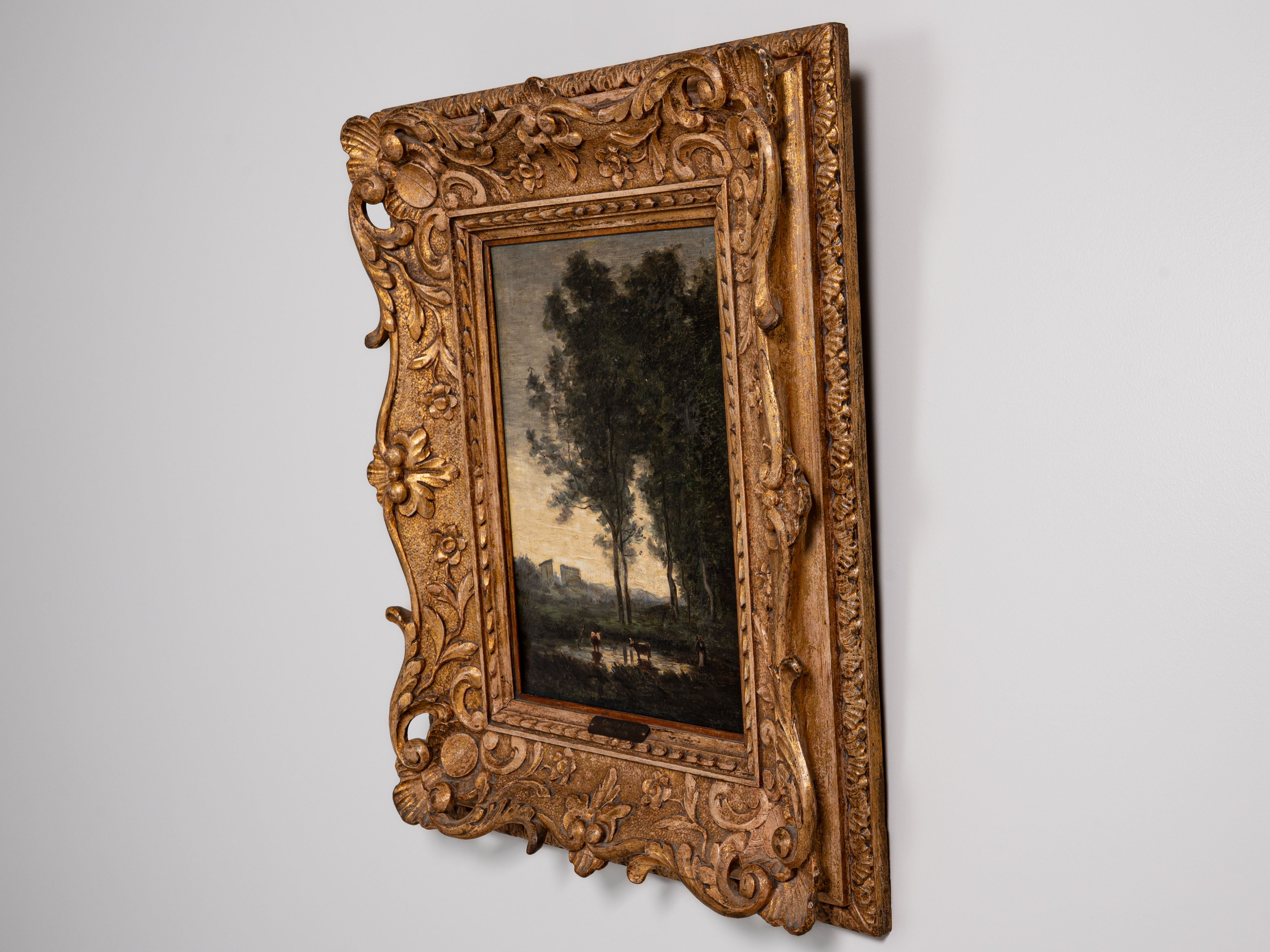 Escola de Jean-Baptiste Camille Corot (1796-1875) Vista de campo com lago, vacas e figura Óleo sobre tela Não assinado Dim. aprox.: 37 x 26 cm